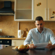 Homeowner reviewing HOA financial documents for a forensic audit request